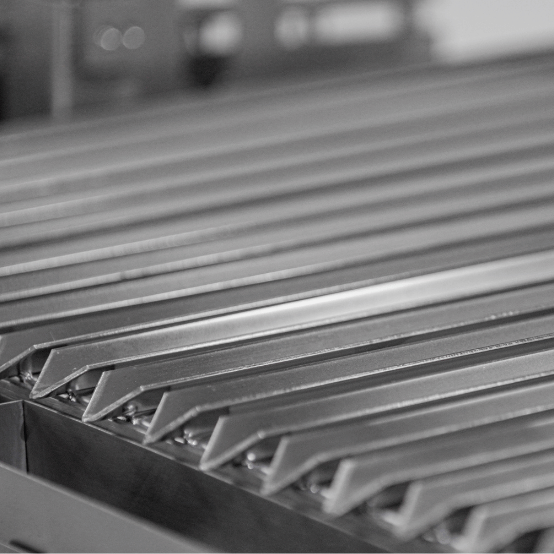 Close-up of metal heat sinks with a blurred background